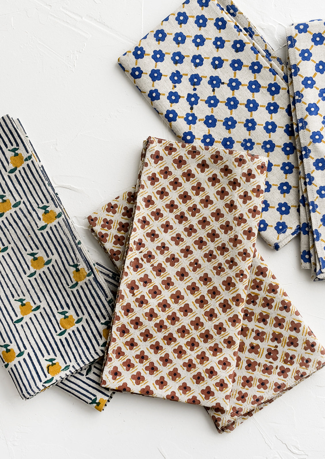 An assortment of block printed cotton napkins.