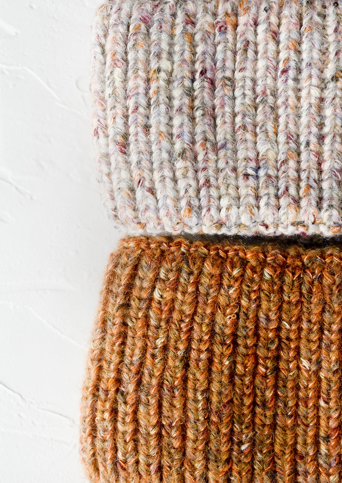 Rib knit yarn with multicolor speckles.