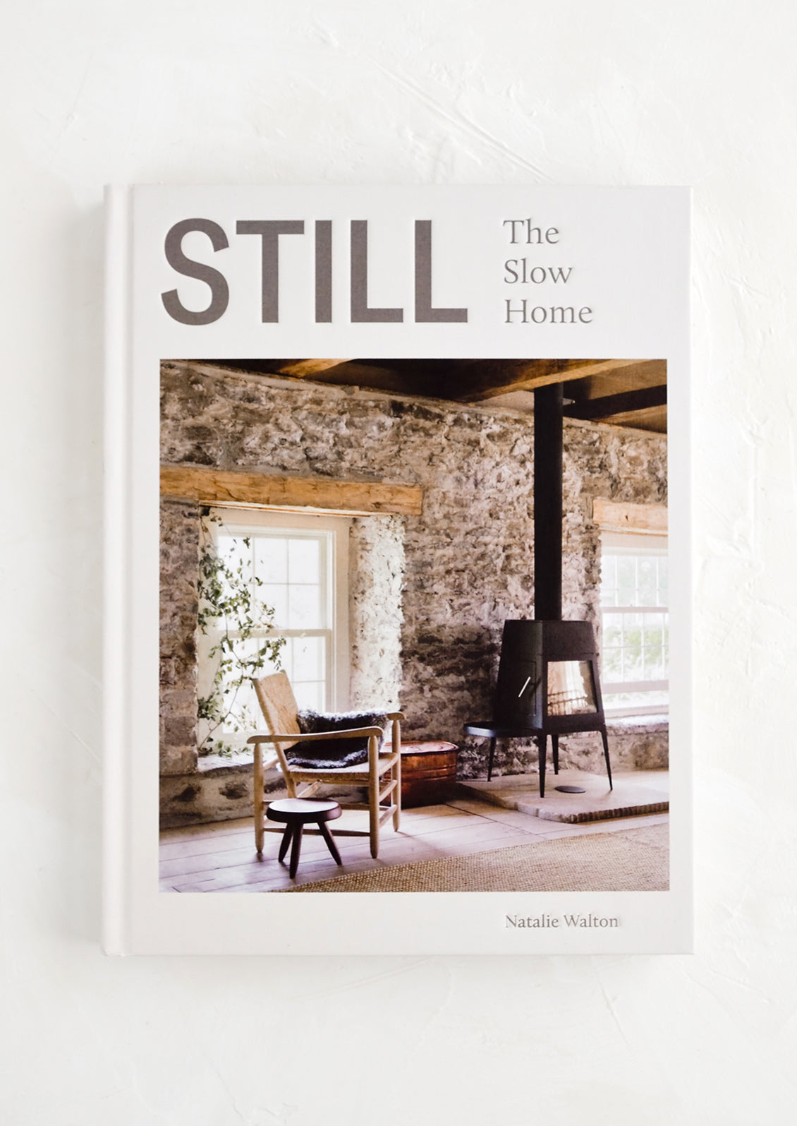 A hardcover book with an interior image on the cover.