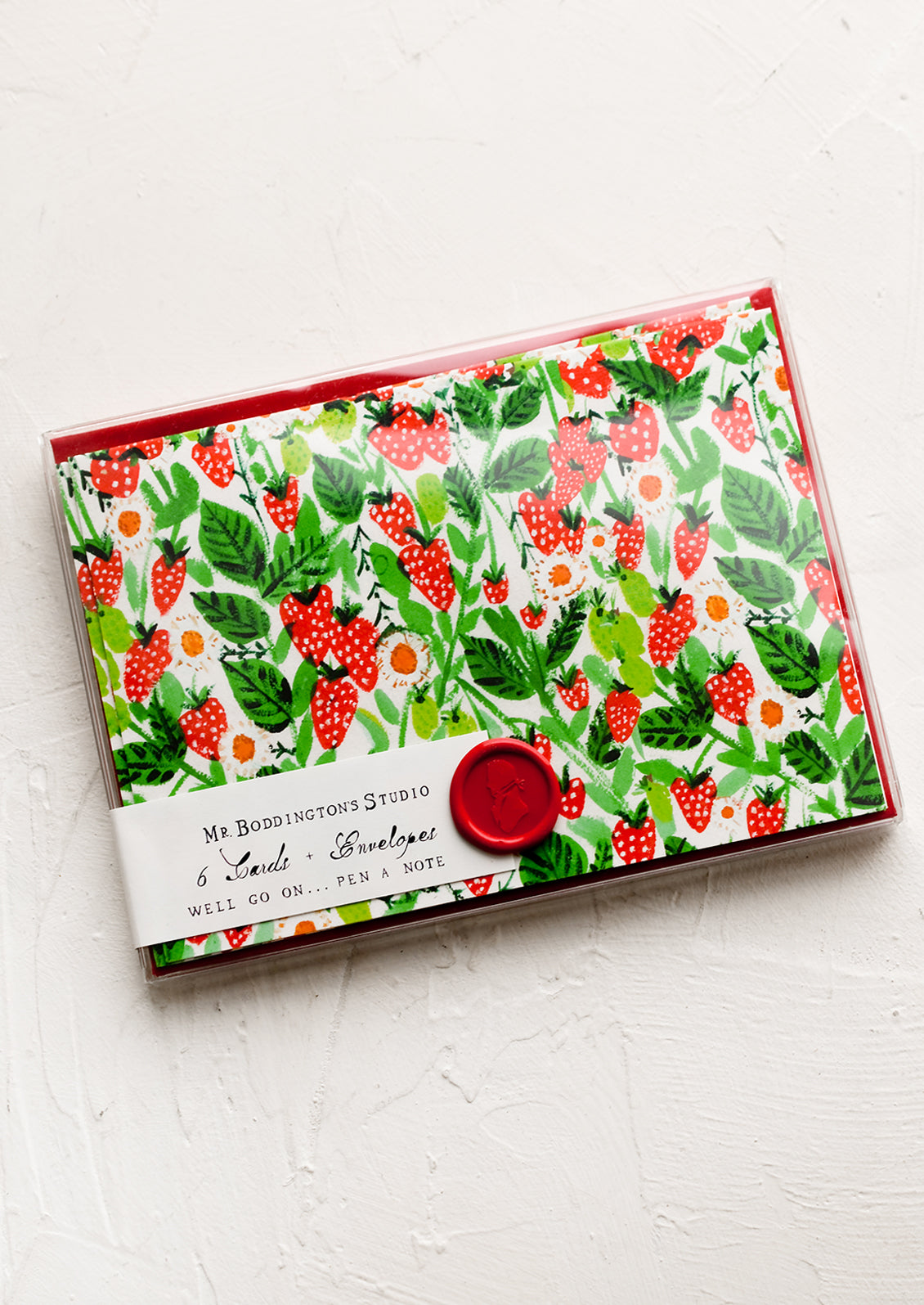 Boxed strawberry card set with wax seal packaging.