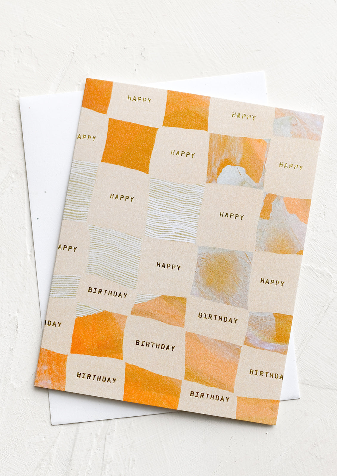 A birthday card with checker print.