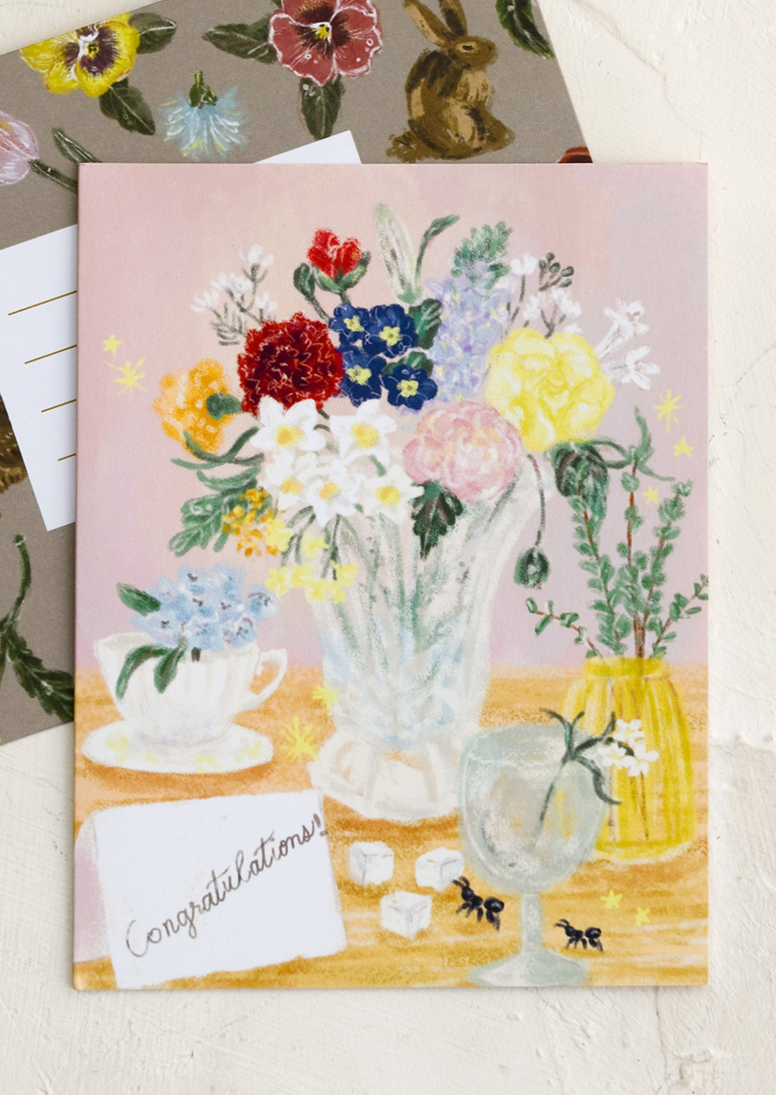 A tablescape print card with placecard illustration reading "Congratulations!".