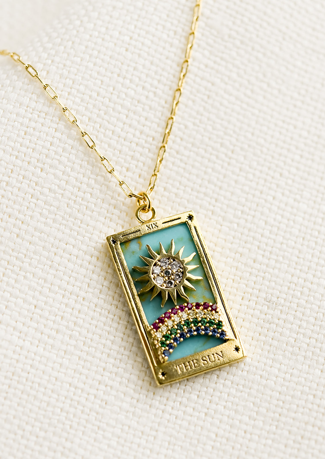 A necklace in style of Sun tarot card.