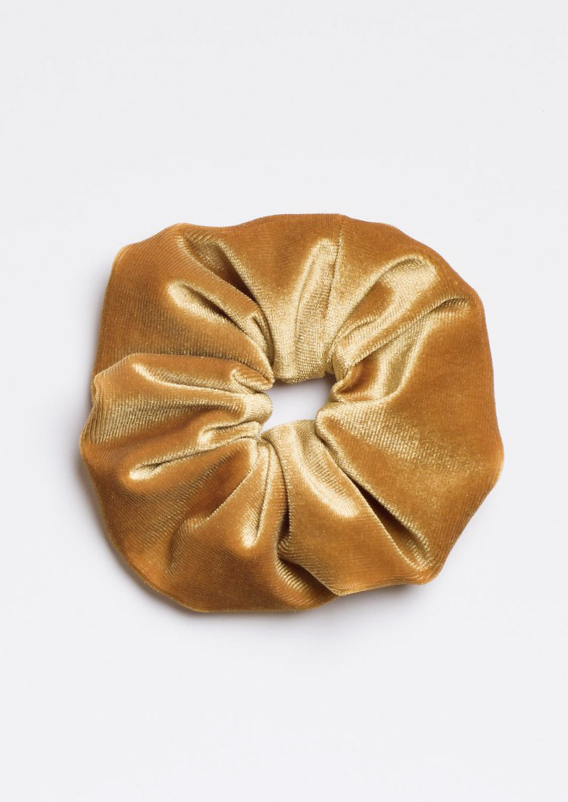 A velvet scrunchie in amber.