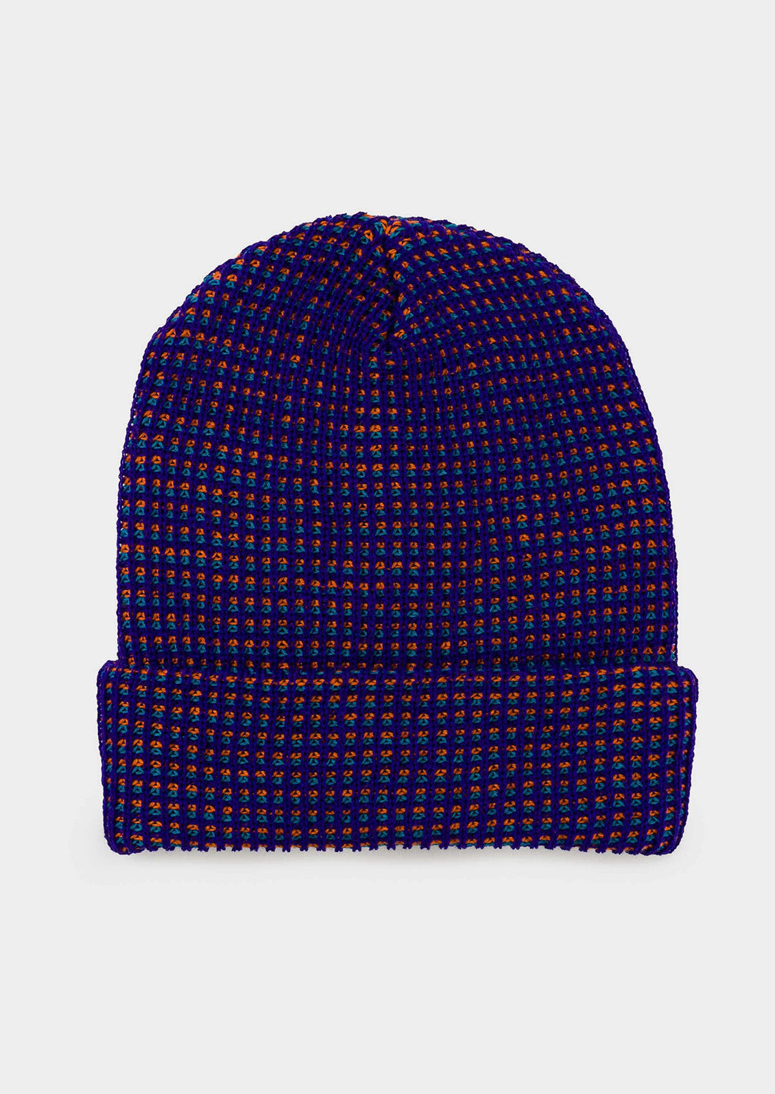 A rib knit beanie in indigo and red.