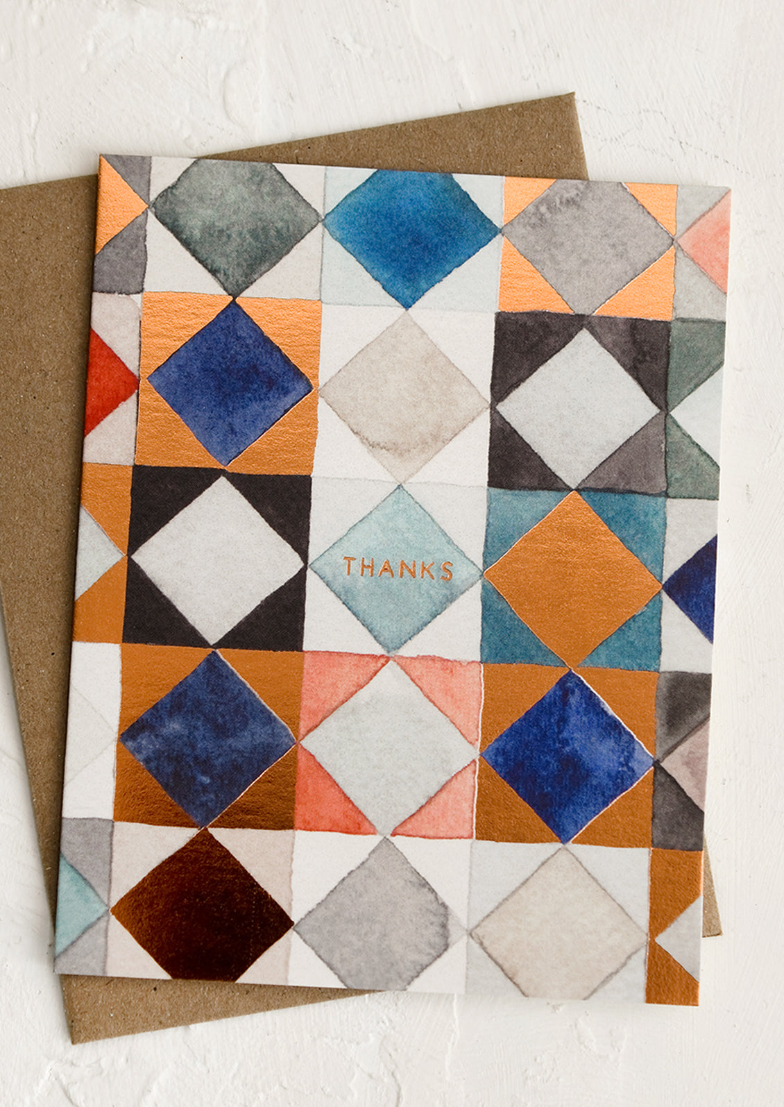 A set of blue and copper quilt print thank you cards.