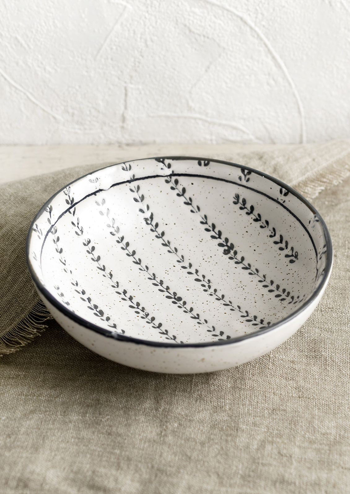A black and white leaf printed cereal bowl.