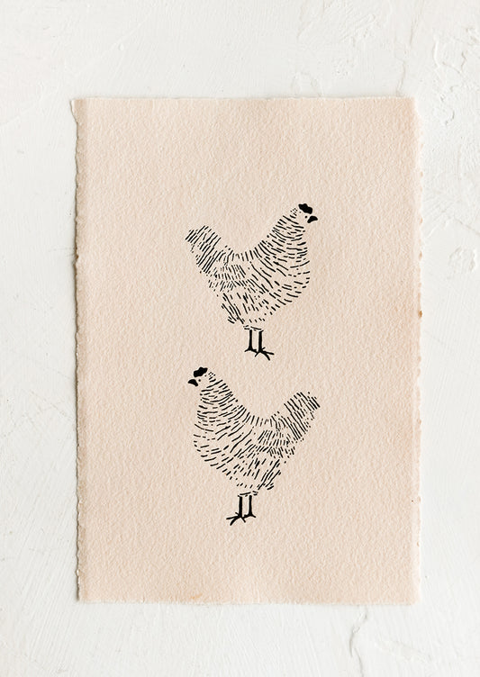 A deckled edge print with two chickens.
